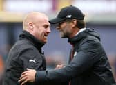 Manager of Liverpool Jurgen Klopp and Sean Dyche, Manager of Burnley embrace ahead of kick off during the Premier League match between Burnley and Liverpool at Turf Moor on August 20, 2016 in Burnley, England.