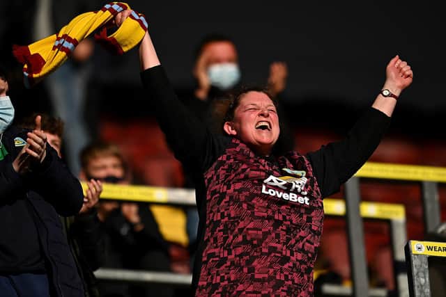 Fans back in attendance prior to the Premier League match between Burnley and Liverpool at Turf Moor on May 19, 2021 in Burnley, England.