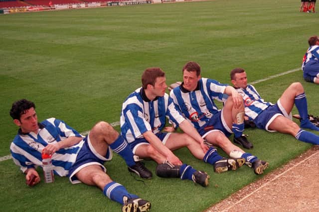 Clitheroe Town  FC - players collapse on the Wembley turf after their defeat to Brigg Town.