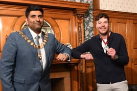 Jordan North receives his award from the Mayor of Burnley, Lord Khan. Picture: Burnley Borough Council