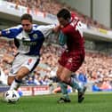 Paul Weller of Burnley tries to tackle David Dunn of Blackburn Rovers during the Nationwide League Division One game between Blackburn Rovers v Burnley at Ewood Park, Blackburn.