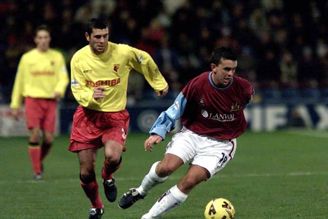 Paul Weller of Burnley beats Paul Robinson of Watford during the Nationwide First Division game between Burnley and Watford at Turf Moor, Burnley.