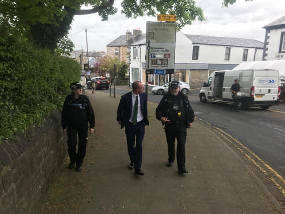 Lancashire's new PCC Andrew Snowden joins local police officers on the beat in Clitheroe