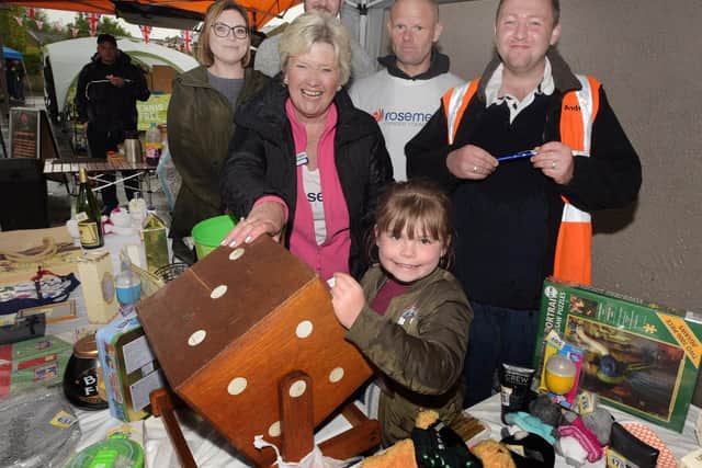 May market organiser Andrew Wallin (pictured far right) on the Rosemere stall at the 2019 market.