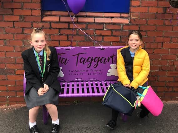 Tia's best friend Chloe Metcalfe (left) could not attend the bench unveiling ceremony as she was at school so her sister Sophie cut the ribbon on her behalf.