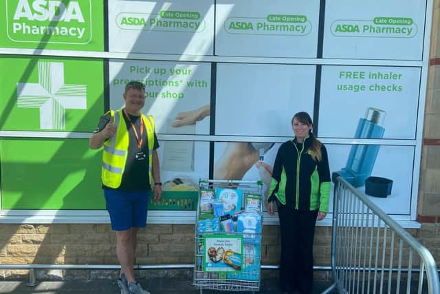 Burnley Together volunteer Geoff Birkett on his rounds at Asda as part of his role