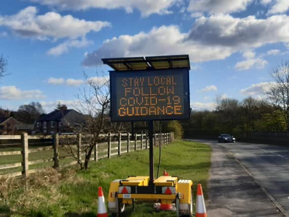 These signs have become a common sight around the North West