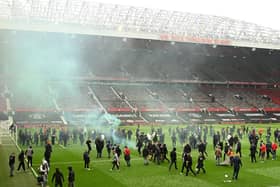 Manchester United fans protest against the European Super League