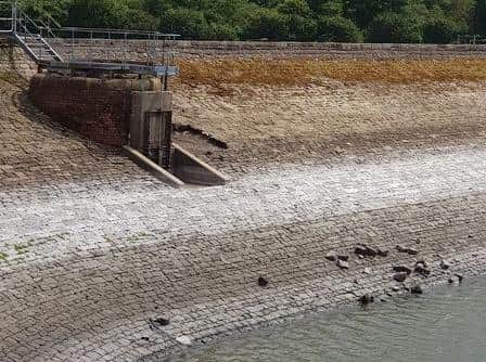 Vandals dislodged retaining wall stones to throw them into the water at Barrowford reservoir