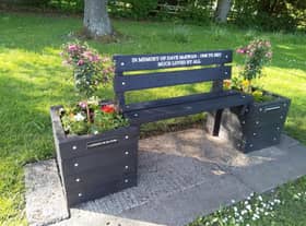 The memorial bench and beautiful plantars in memory of Dave McEwan