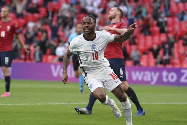 Raheem Sterling celebrates his early goal which settled the match against the Czech Republic