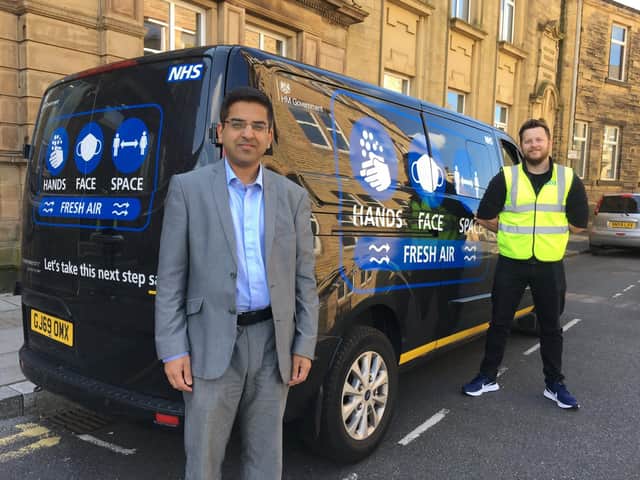 Coun. Nadeem Ahmed with Tom Willey of the Cabinet Office street team
