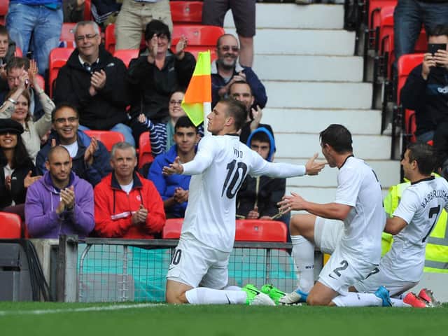 Chris Wood celebrates his goal against Egypt at Old Trafford in 2012