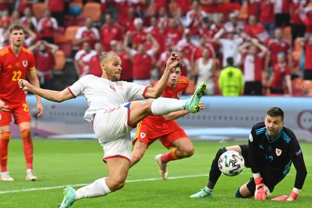 Martin Braithwaite of Denmark shoots and hits the post during the UEFA Euro 2020 Championship Round of 16 match between Wales and Denmark at Johan Cruijff Arena on June 26, 2021 in Amsterdam, Netherlands.