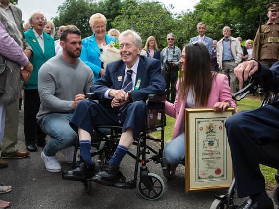 This wonderful photo by Naz Alam was taken at the event last weekend where Bob is pictured surrounded by family, friends and well wishers including his granddaughter Sophie and wife Ann