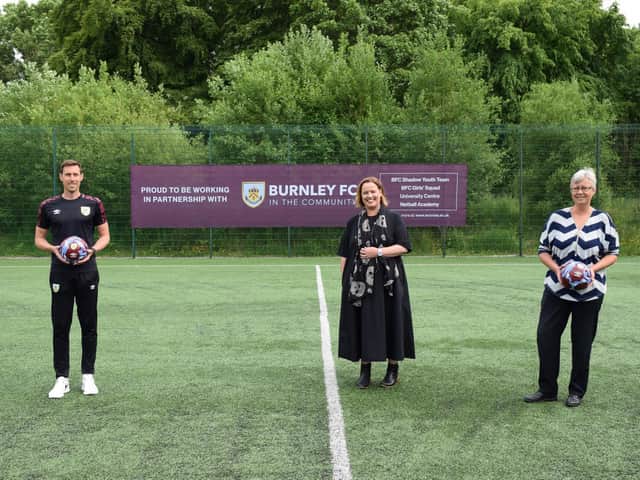 Chris Andrews, Head of Football Development at Burnley FC in the Community, Dr Sara Ward, Chief Executive of Burnley FC in the Community, and Charlotte Scheffmann, Dean of Higher Education at Nelson and Colne College Group University Centre.