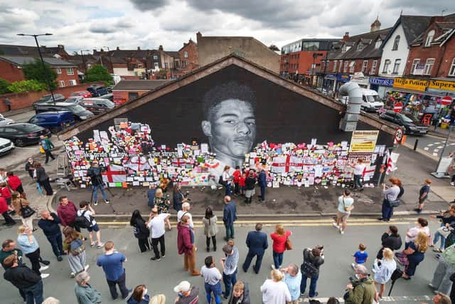 Fans obliterated the abuse messages on the Rashford mural by posting messages of love and support (Getty Images)