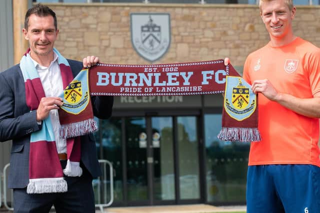 Andy MacKenzie, Spreadex Head of Marketing Operations and Content, and Burnley club captain Ben Mee.