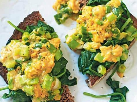 Scrambled eggs and spinach on rye