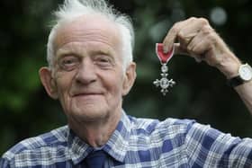 Ken Spencer with his MBE in 2016
