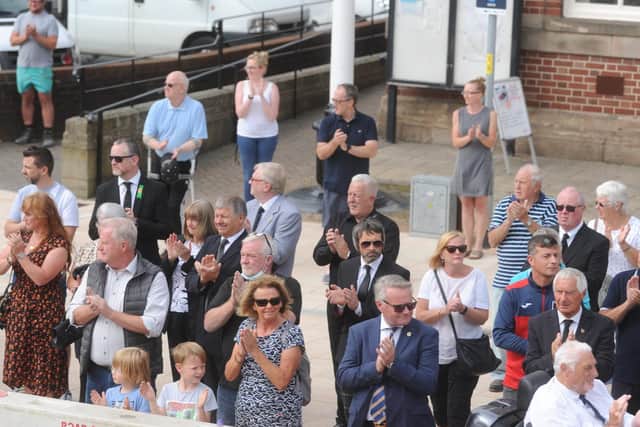 Mourners lined to route to pay their respects to Bob Clark whose funeral was held last week
