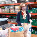 Jane Chitnis, Ribble Valley Foodbank Manager, packing at the warehouse