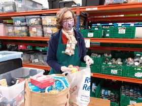 Jane Chitnis, Ribble Valley Foodbank Manager, packing at the warehouse