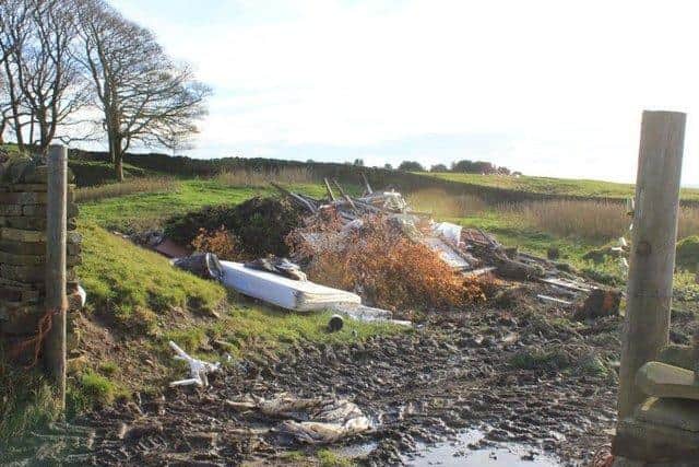 Rubbish on Delves Lane, Colne, in 2018