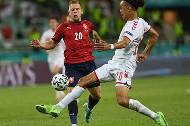 Denmark's forward Yussuf Poulsen (R) fights for the ball with Czech Republic's forward Matej Vydra during the UEFA EURO 2020 quarter-final football match between the Czech Republic and Denmark at the Olympic Stadium in Baku on July 3, 2021.
