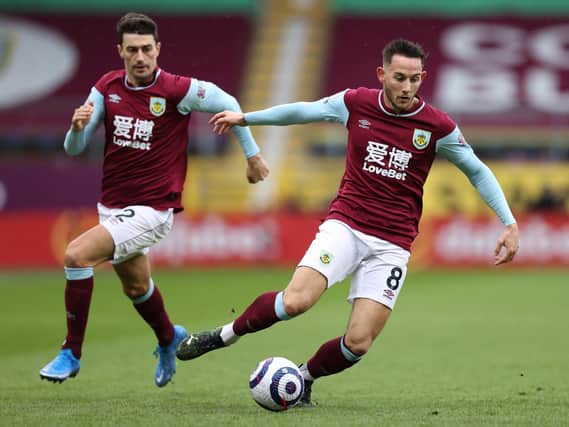 Josh Brownhill of Burnley in action during the Premier League match between Burnley and West Bromwich Albion at Turf Moor on February 20, 2021 in Burnley, England.