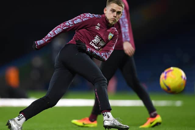 Burnley's English midfielder Josh Benson warms up ahead of the English Premier League football match between Burnley and Manchester City at Turf Moor in Burnley, north west England on February 3, 2021.