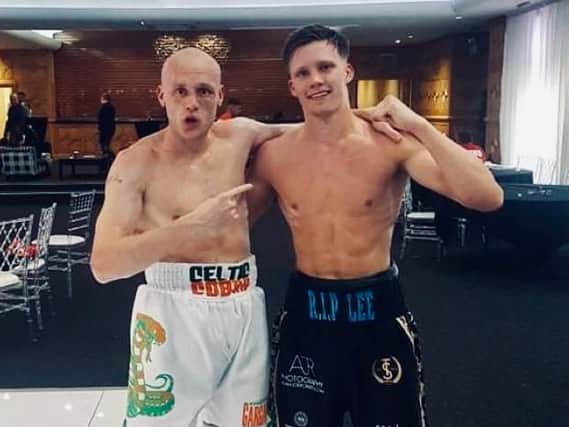 Seamus Devlin (left) alongside opponent Leon Willings