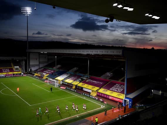 General view inside the stadium as players of Burnley walk out prior to The Emirates FA Cup Fifth Round match between Burnley and AFC Bournemouth at Turf Moor on February 09, 2021 in Burnley, England.