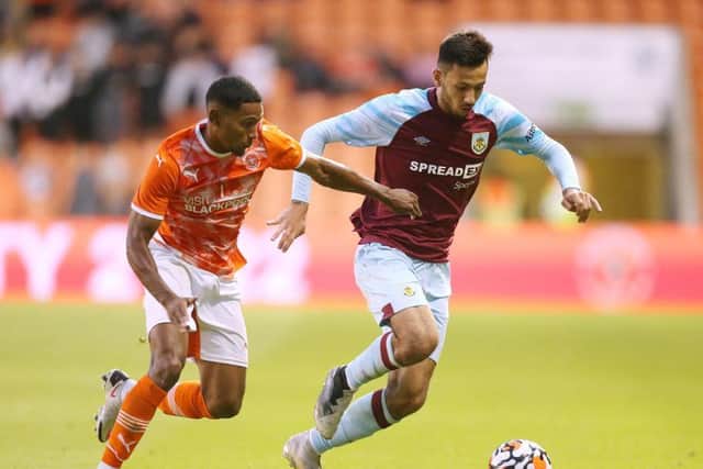 Burnley's Dwight McNeil in possession against Blackpool.