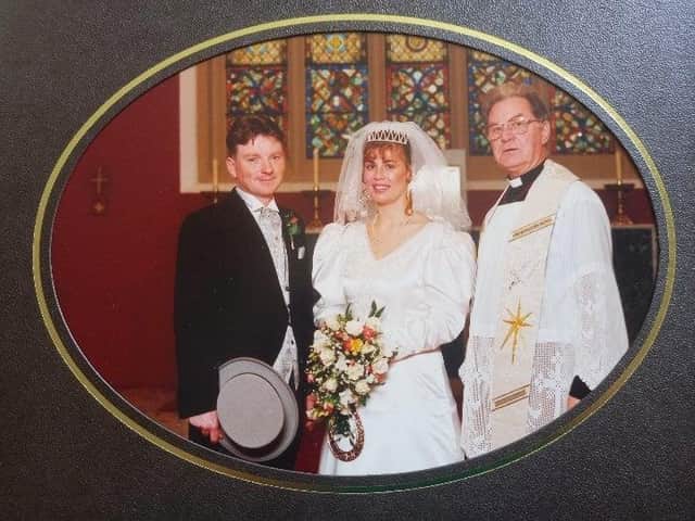 Canon Deeney when he officiated at the wedding of Paul and Carol Biddulph at St Mary's Church in Burnley in October, 1994.