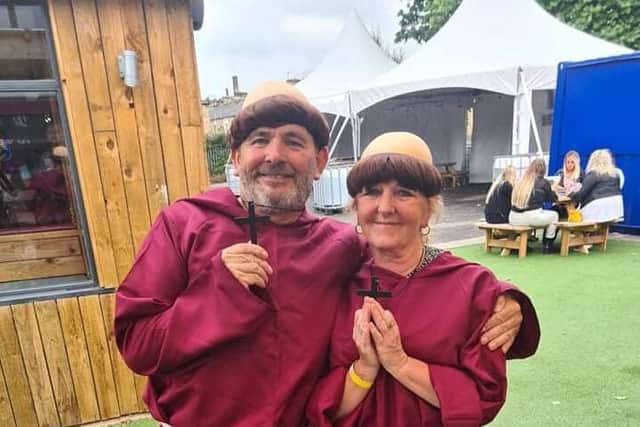 Two praying monks joined in with the pub crawl