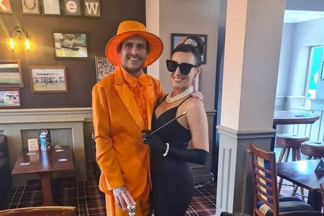 Ryan as Dumb from Dumb and Dumber with his wife Chloe as Audrey Hepburn