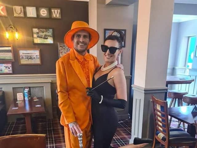Ryan as Dumb from Dumb and Dumber with his wife Chloe as Audrey Hepburn