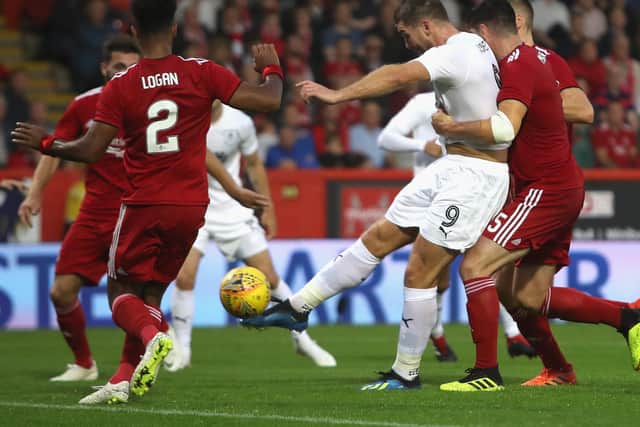 Sam Vokes of Burnley scores his sides first goal during the UEFA Europa League Second Qualifying Round 1st Leg match between Aberdeen and Burnley at Pittodrie Stadium on July 26, 2018 in Aberdeen, Scotland.