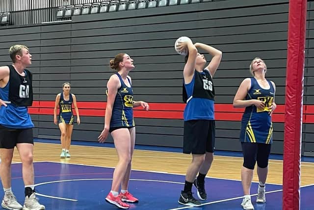 Netball ace James Firminger, pictured with the ball, scored 85 goals in five games with a 91% shot accuracy at the 2021 National Men's & Mixed Netball Tournament.