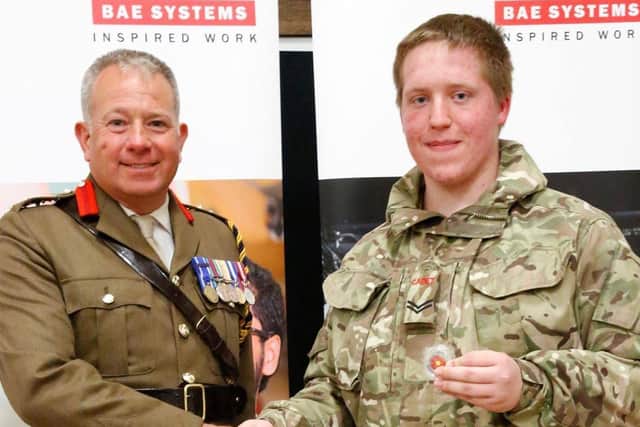 Andrew with Neil Jurd OBE of the Lancashire Army Cadets after he raised £7,000 for the poppy appeal