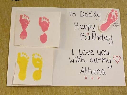 Tyson Fury shows off his birthday card from newborn daughter Athena. Photo from Instagram @gypsyking101