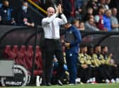 Sean Dyche, Manager of Burnley applauds the fans prior to the Premier League match between Burnley and Brighton & Hove Albion at Turf Moor on August 14, 2021 in Burnley, England.
