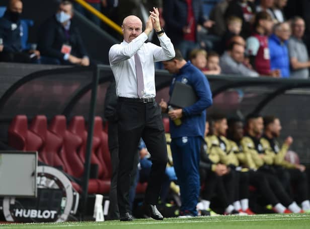 Sean Dyche, Manager of Burnley applauds the fans prior to the Premier League match between Burnley and Brighton & Hove Albion at Turf Moor on August 14, 2021 in Burnley, England.