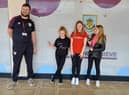 Neve Parkinson, Connie Cardiff and Evie Broadley at the Burnley FC Community Kitchen