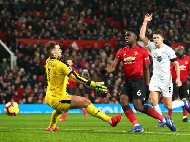 Paul Pogba of Manchester United scores his team's first goal past Thomas Heaton of Burnley but it is later disallowed during the Premier League match between Manchester United and Burnley at Old Trafford on January 29, 2019 in Manchester, United Kingdom.