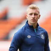Ben Mee of Burnley looks on as he makes his way towards the dressing room after inspecting the pitch prior to the Pre-Season Friendly match between Blackpool and Burnley at Bloomfield Road on July 27, 2021 in Blackpool, England.