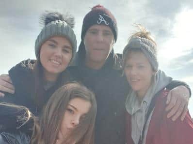Nick with his wife Caroline and their daughters Freya and Heidi