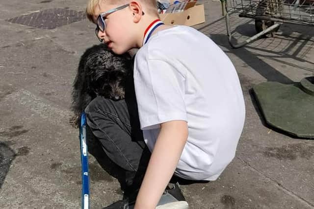 Youngsters and their four-legged friends turn out in force for the charity dog walk