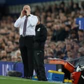 Sean Dyche, Manager of Burnley gives their team instructions during the Premier League match between Everton and Burnley at Goodison Park on September 13, 2021 in Liverpool, England.
